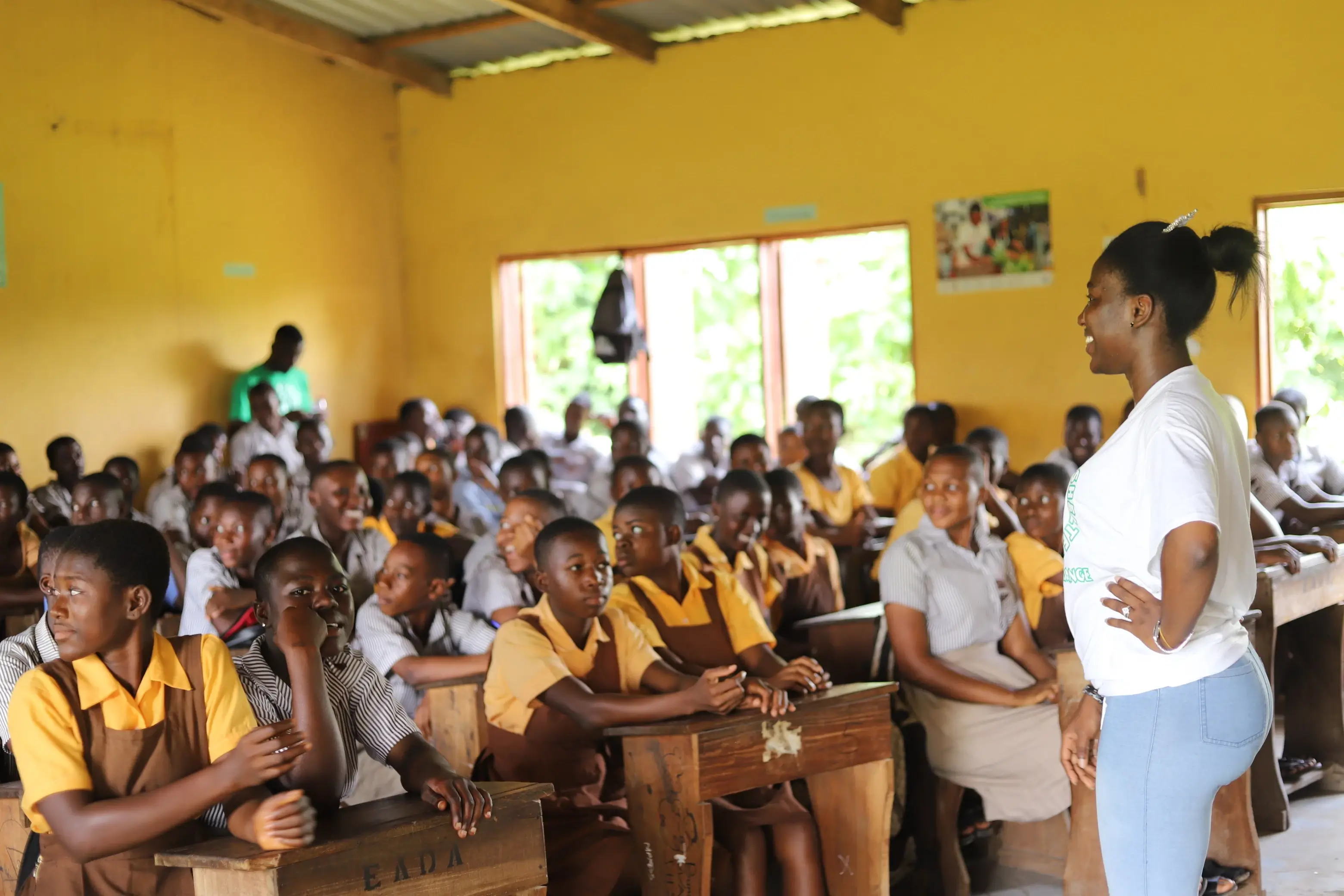 Children in rural Ghana engaging in educational activities supported by Le Shelter Foundation